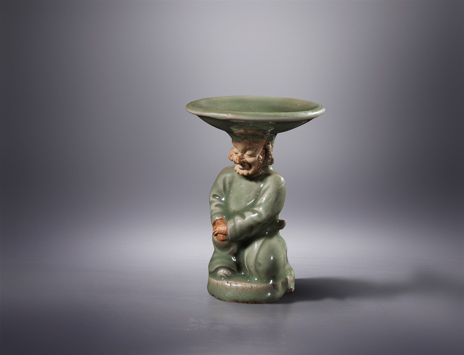 龙泉窑青釉胎胡人型烛台