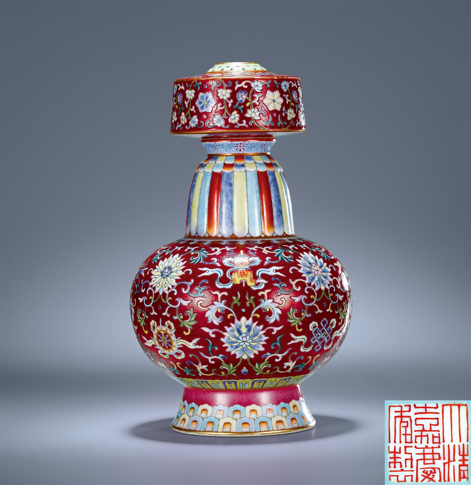 胭脂红地粉彩莲托八吉祥纹贲巴瓶(图录号：1173)