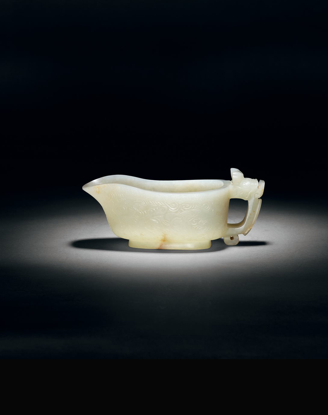 白玉勾连云纹兽耳匜